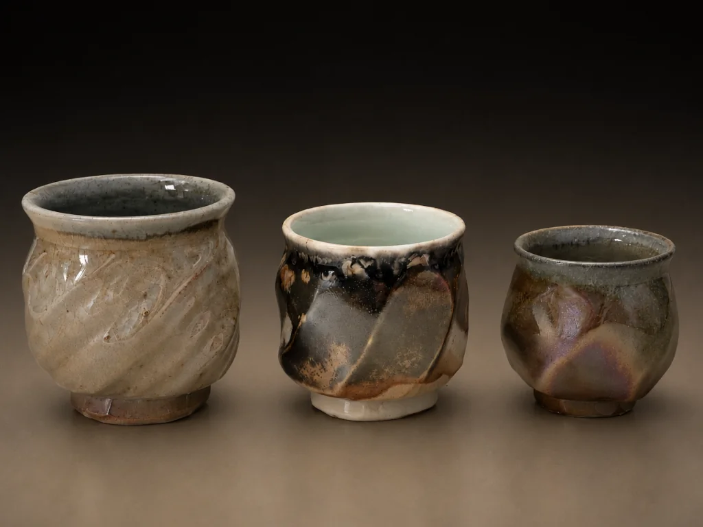Three teacups in assorted sizes
