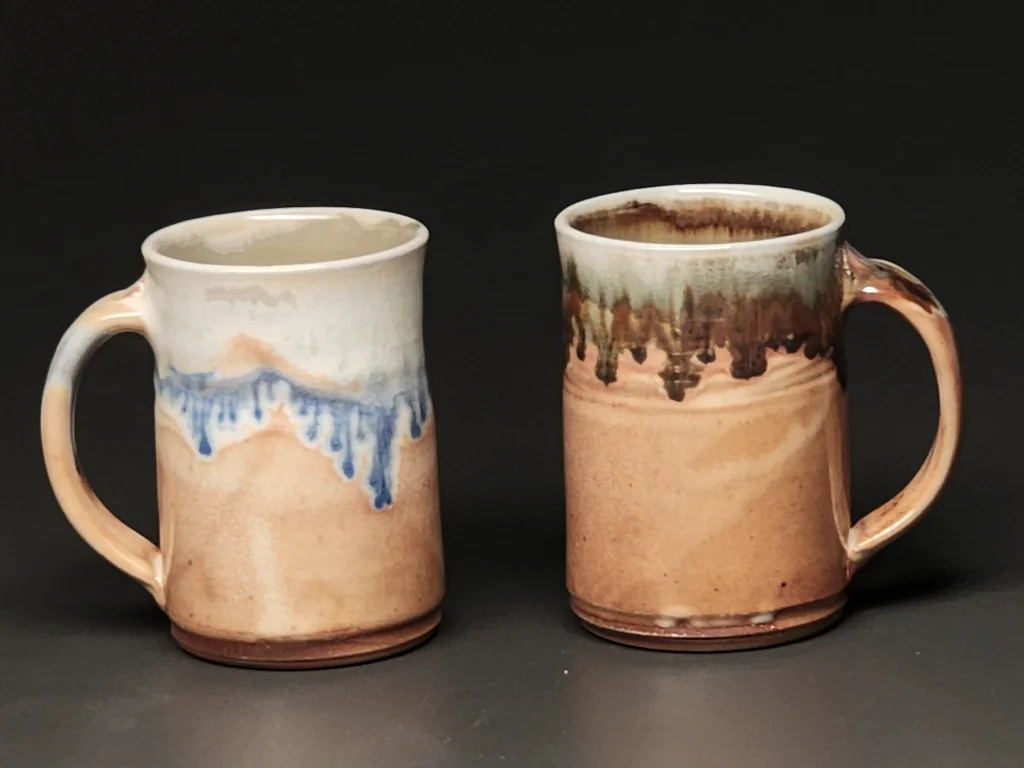 Two medium mugs with layered blue glaze