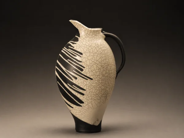 Large raku pitcher with crackle glaze