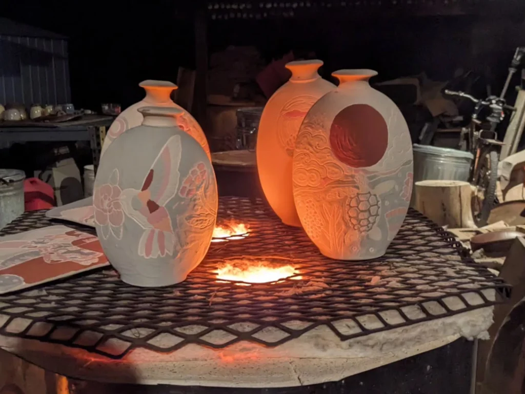 Raku firing vases in process