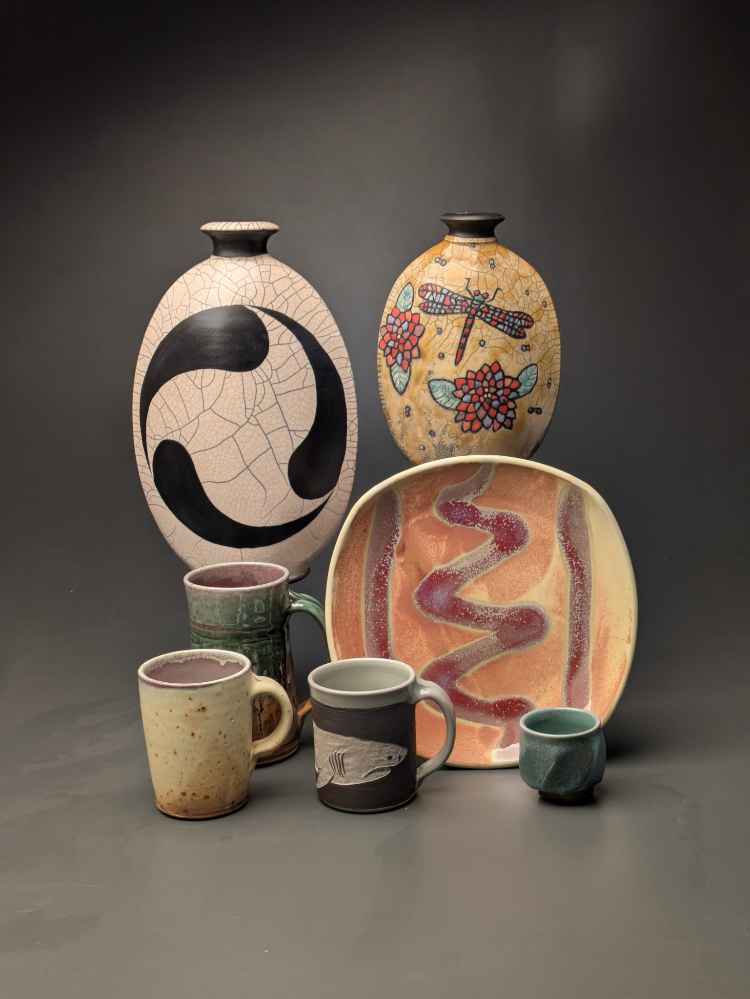 Spring show display with vases, platter and mugs