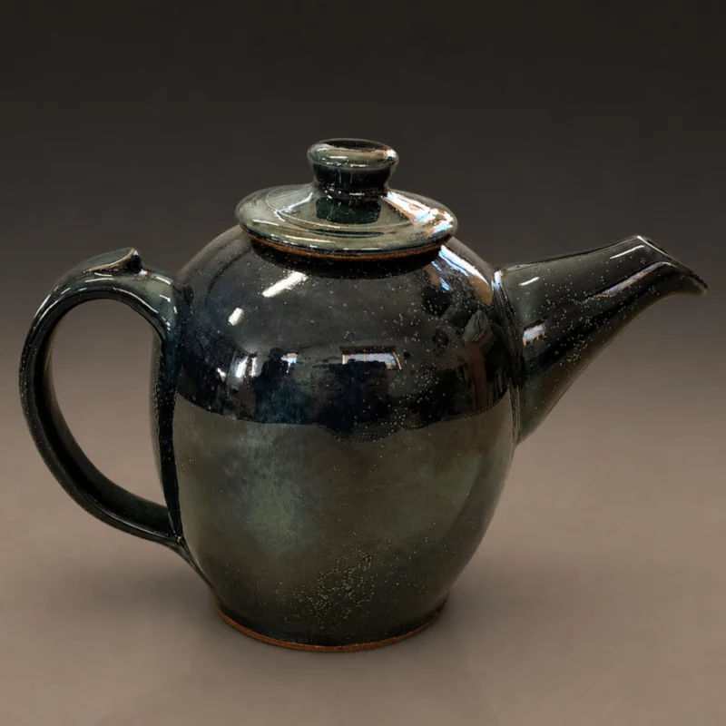 Green shiny glaze teapot with wood handle