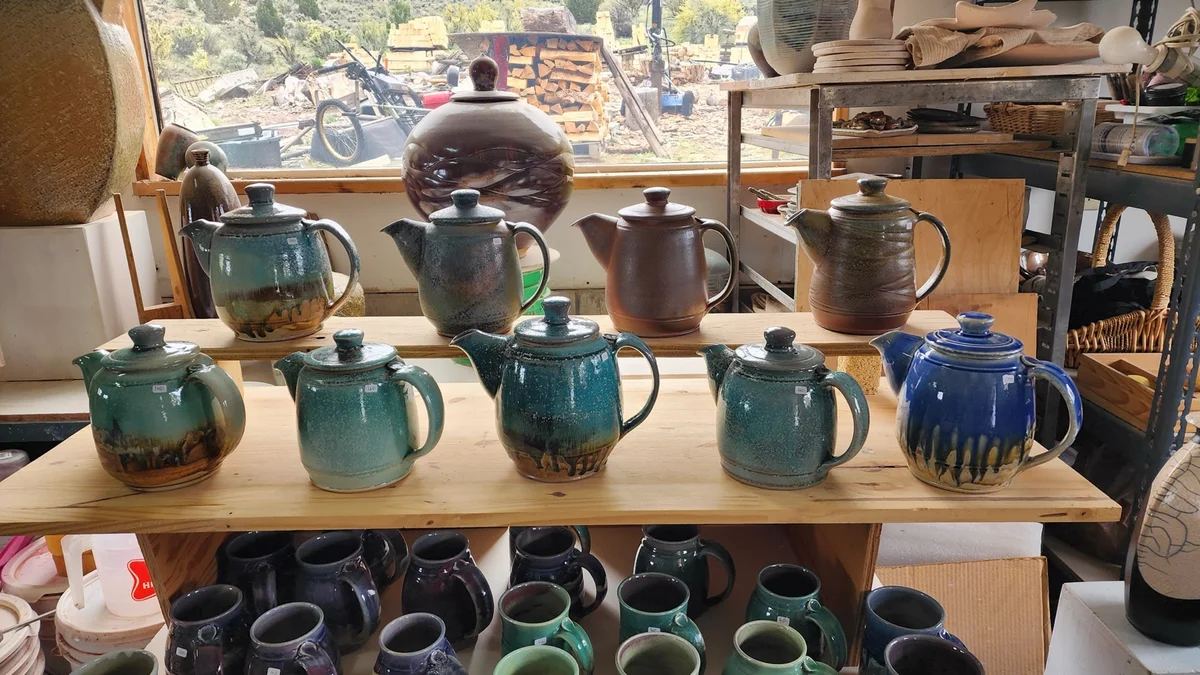 Teapot collection on shelves